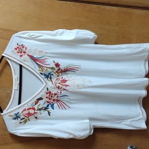 Solitaire shirt size XL.  Off white with multi-color embroidery.